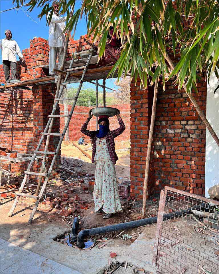 Girls in the brickworks get nourished by Baba's Feed Project